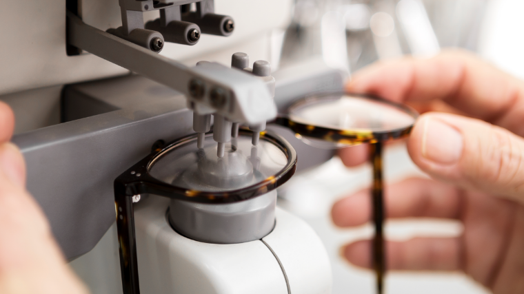 A pair of eyeglasses being manufactured