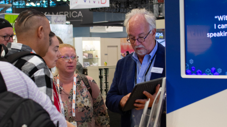 Dr. Duane Wires demoing Eyefinity EHR on an iPad at Vision Expo East