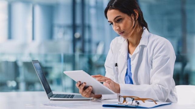Provider looking at an ipad