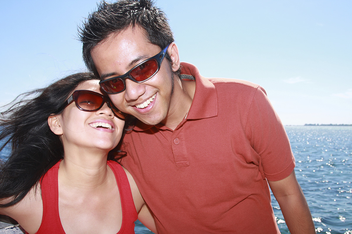 young girl and guy with sunglasses